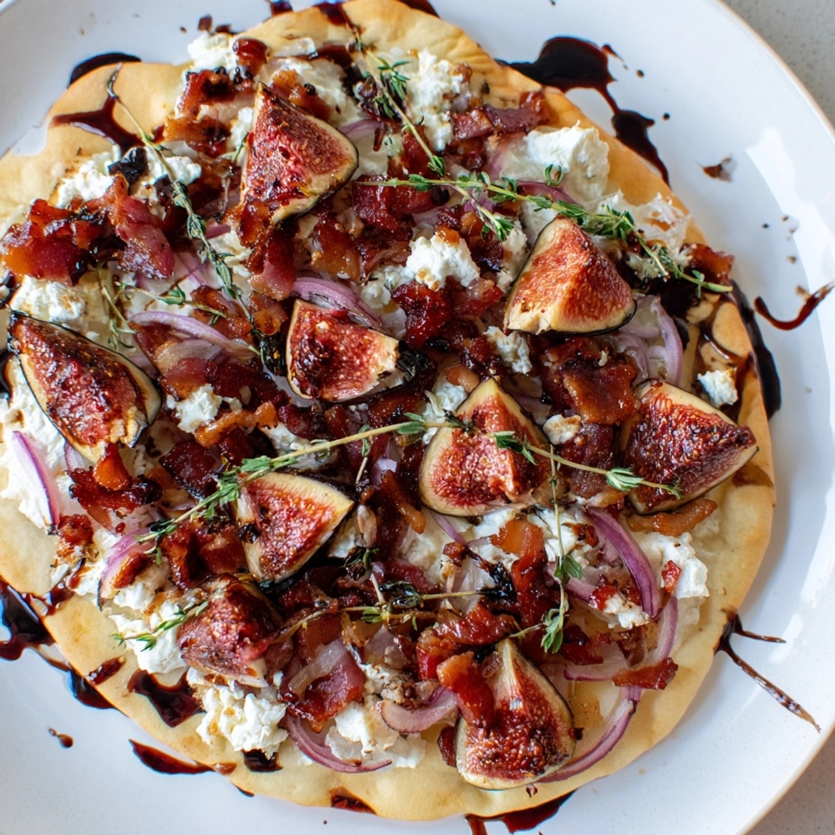 Savory Roasted Balsamic Fig & Bacon Flatbread: caramelized figs and crispy bacon delight.