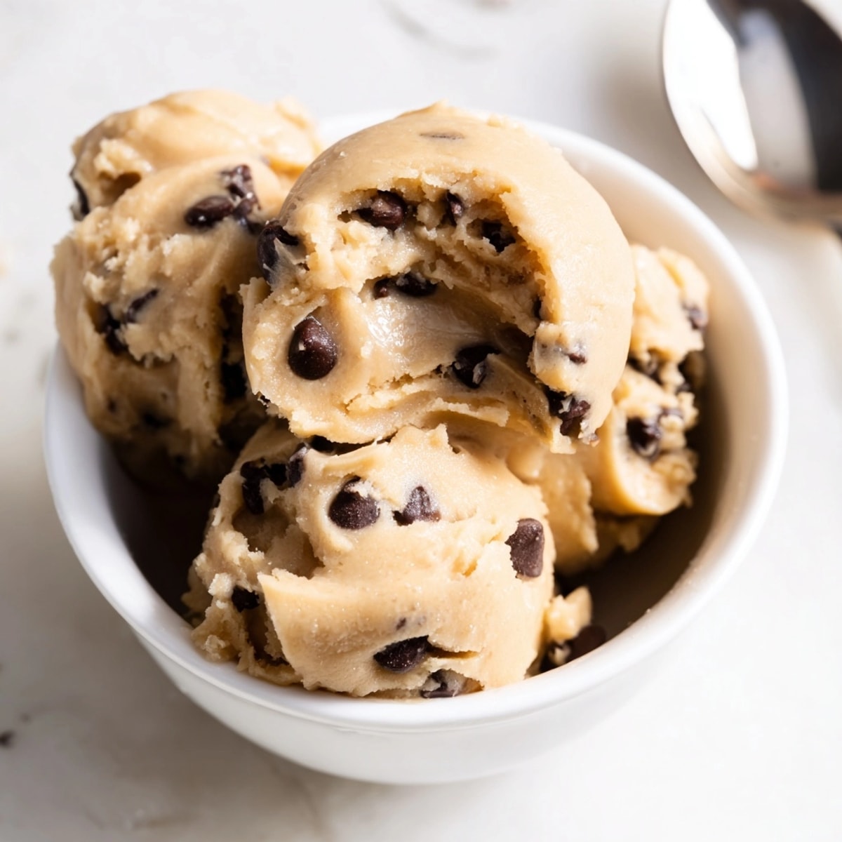 Close-up of rich, buttery edible cookie dough; perfect easy dessert for the whole family.