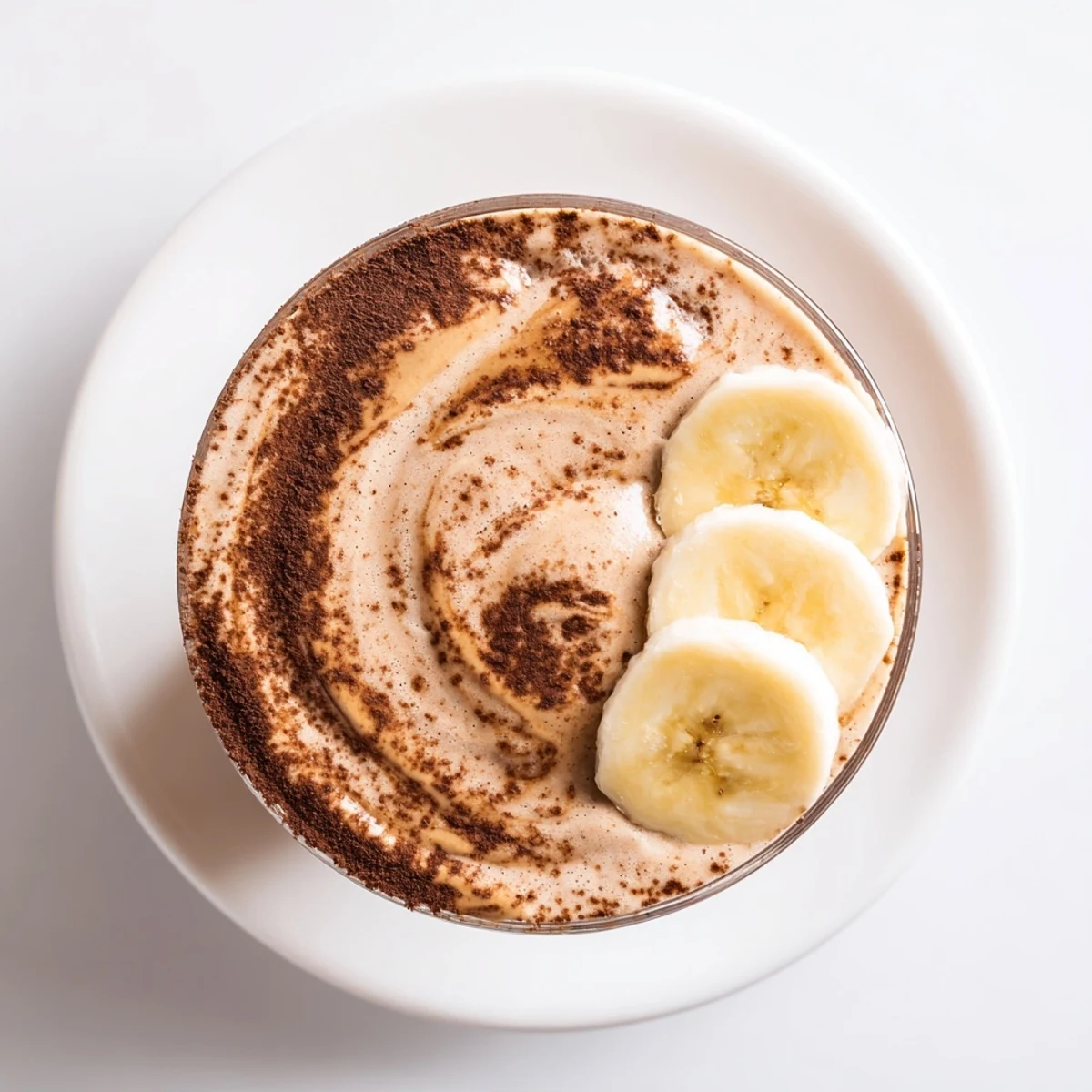 A refreshing, vibrant photo showcases a Chocolate Peanut Butter Smoothie, perfect for a quick breakfast treat.