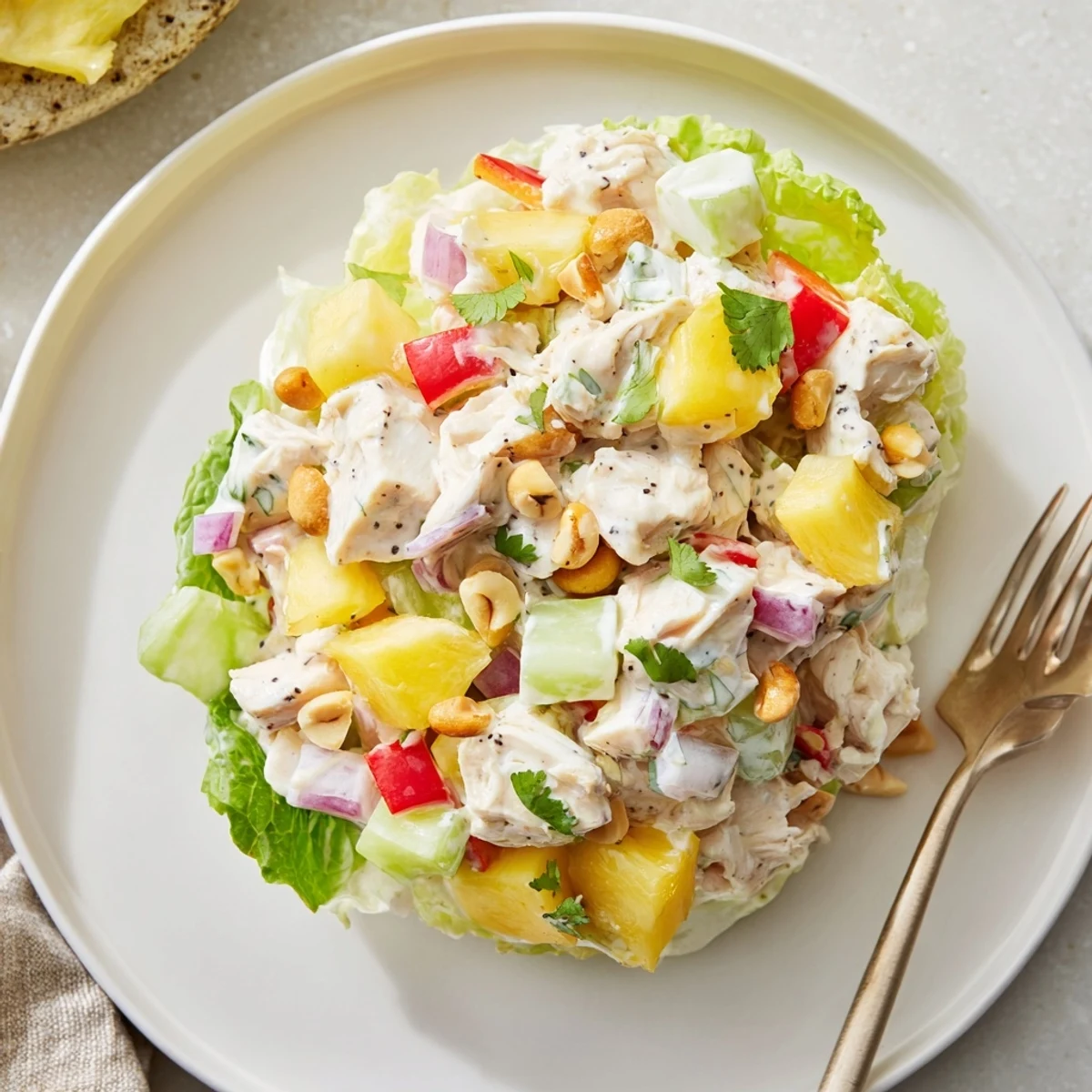 Chilled Hawaiian Chicken Salad served on butter lettuce, zesty lime aroma