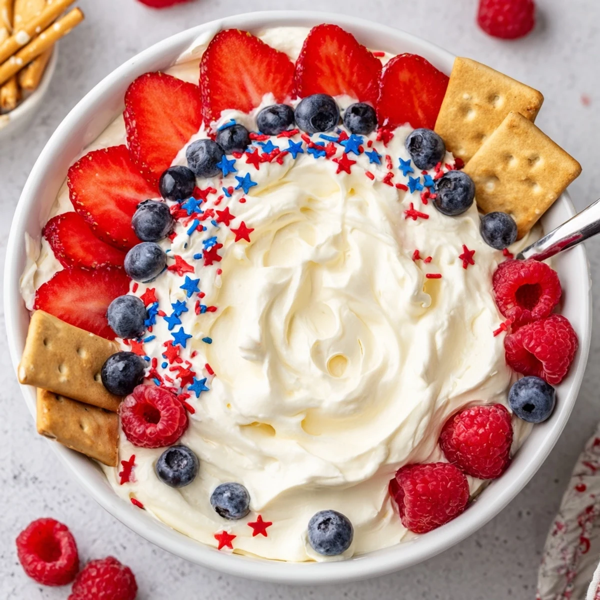 Festive Star Spangled Cheesecake Dip with pillowy texture, chilled, ready for dipping