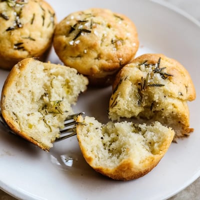 Warm Garlic Rosemary Focaccia Muffins served with balsamic and olive oil dip